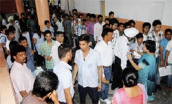 Students submit forms during the third counselling at GMSS-19 in Chandigarh on Monday. Tribune photo: Manoj Mahajan
