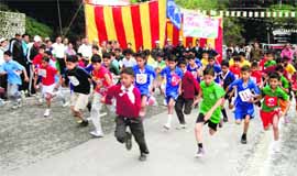 Children take part in a Run for Nation marathon in Mussoorie on Monday.