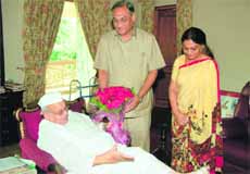 Chief Minister Vijay Bahuguna and his wife Sudha Bahuguna meet Governor Aziz Qureshi at Raj Bhawan in Dehradun.