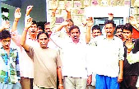 Residents hold a protest against disruption in water supply in Palampur