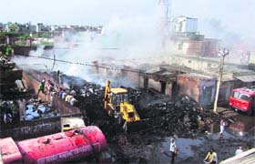 Fire tenders try to douse flames at a tyre godown in Baldev Nagar, Jalandhar, on Monday