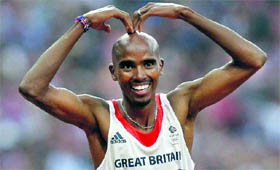 Britain's Mohamed Farah celebrates his win in the men's q5000-meter final.