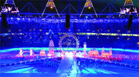 An image of a swimmer is displayed on the wall of the Houses of Parliament.