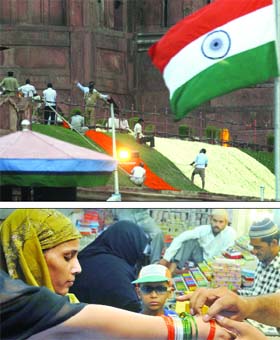 Workers decorate the Red Fort for the Independence Day function in Delhi on Tuesday as residents get ready to celebrate the day in their own ways (below)