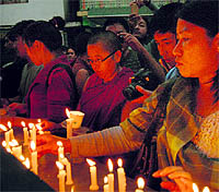 Tibetans-in-exile hold a candlelight march at McLeodganj on Tuesday