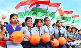 Schoolchildren rehearse for the Independence Day celebrations in Agartala.