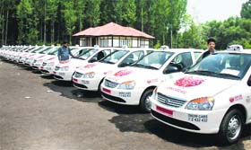 Radio taxis parked at a taxi stand in Srinagar