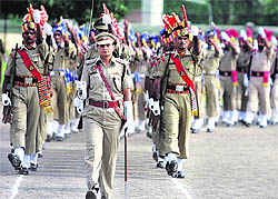 ACP Manjit Kaur leads the march past during the full dress rehearsal held for the Independence Day function at the PAP ground in Jalandhar on Monday