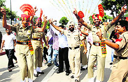 BSF jawans dance to celebrate Independence Day at the joint check-post at Attari in Amritsar