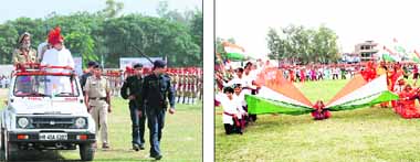 (Left) Chief Minister Bhupinder Singh Hooda inspects the guard of honour during the Independence Day celebrations in Karnal; (right) schoolchildren exhibit their talent in Rohtak. 