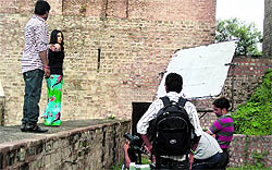 Mumbai-based actress Komal and Punjabi singer-turned-actor Sohan Shankar shoot for a song at the Bhimgarh Fort in Reasi on Thursday