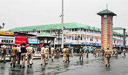 Police and paramilitary troopers patrol the Lal Chowk area on the Independence Day