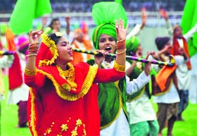 Students perform giddha during the Independence Day celebrations at Guru Nanak Stadium in Ludhiana