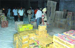A raid was conducted at an unauthorised cracker godown in Sivian village on Friday evening. Crackers were being stored and sold there in violation of norms. Tribune photo: Pawan Sharma