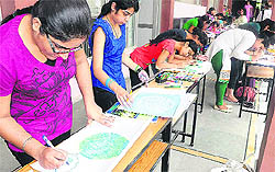 Students take part in a painting competition during Sadbhavana Day celebrations at Dev Samaj College, Sector 45, in Chandigarh on Friday