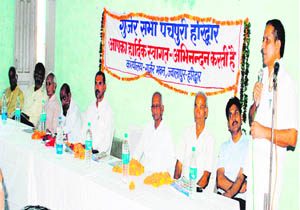A speaker adresses a convention of the Gujjar Sabha at the Gujjar Bhawan at Jwalapur in Haridwar on Friday. 
