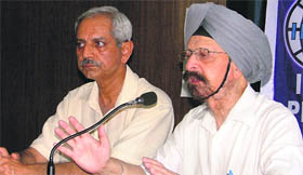 Dr LS Chawla (right) of IDPD addresses a news conference in Ludhian.