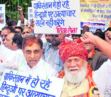 Shiv Sena activists protest against Pakistans alleged discrimination and violence against Hindus in New Delhi on Friday. 
