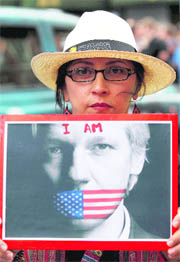 A supporter of Julian Assange outside the Ecuador Embassy in London.