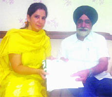 Dr Navjot Kaur Sidhu during her meeting with Education Minister Sikandar Singh Malooka in Amritsar on Saturday. 
