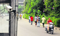 A closed-circuit television camera installed at the Gate No. 2 in Panjab University. 