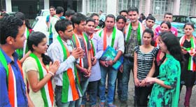 Students of the HPU Regional Centre campaign at Dharamsala on Saturday