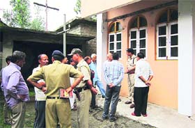 Police personnel investigate the murder of a traffic policeman at Baijnath on Saturday
