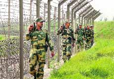 BSF soldiers guard the international border in Jammu.