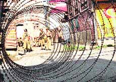 Concertina wires laid on a road in Srinagar. 