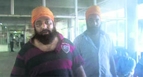 Panchkula ACP Adarshdeep Singh (right), and his brother Gangandeep Singh at the GMCH, Sector-32, Chandigarh, on Sunday.