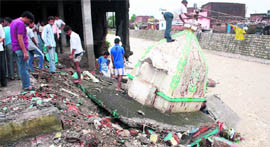 Deepnagar Shiv Temple along the Rispana damaged in Dehradun on Sunday.