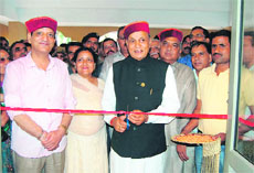 Chief Minister PK Dhumal inaugurates the Mini-Secretariat building at Dharamsala on Sunday.
