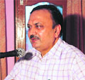 Rajinder Singh Thakur, DC, addresses a workshop on burn injuries in Hamirpur on Saturday.