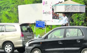 A traffic policeman regulates traffic in Jammu