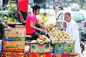 A customer looks at different varieties of bread in Anantnag