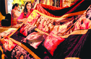 Madhubalas pictures add splendour to cushion and bedsheets. 