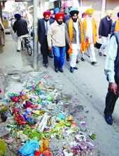 Garbage lies scattered on a roadside enroute to a holy pond in Amritsar. 
