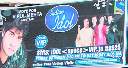 Family and friends of Amit Kumar and Vipul Mehta, finalists in Indian Idol-6, seek SMS vote for them in Amritsar. 