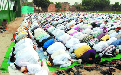 Muslims offer prayers on the occasion of Eid-ul-Fitr at the Eidgah in Bathinda on Monday.