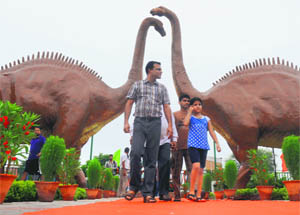 Residents enjoy an evening at the Valley of Animal Garden, Sector 49, in Chandigarh on Monday. 