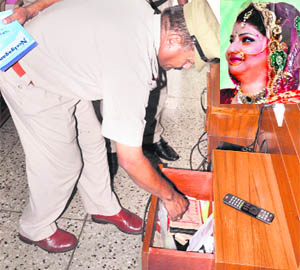 Police officials look for clues at the house where Mehak was found dead in Panchkula on Monday.