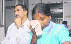 Malti Devi narrates her tale of woes in Jalandhar on Monday. 