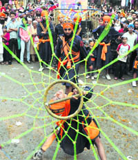 A boy performs Sikh martial art gatka in Ludhiana.