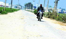 The deplorable condition of the Jagraon-Mallha road.