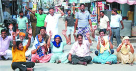 Residents of Paras Ram Nagar lead by former municipal councillor Vijay Kumar stage protest to demand the cleaning of blocked sewer lines in the area.