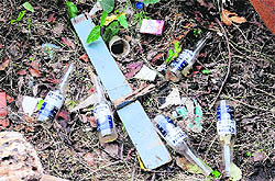 Empty beer bottles and cigarette packets near the Lake Club swimming pool on Tuesday