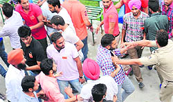 The police tries to disperse them at Panjab University in Chandigarh on Tuesday