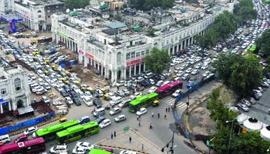 A heavy traffic jam in Connaught Place after the rain in the morning in New Delhi on Tuesday. Tribune photo:Manas Ranjan Bhui