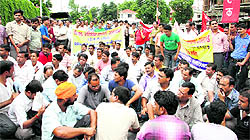 Trained unemployed BEd teachers stage a protest in front of the Civil Secretariat in Dehradun on Tuesday