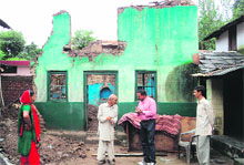 A house completely destroyed in heavy rain under the lower Ghyana panchayat near Dharamsala on Tuesday
